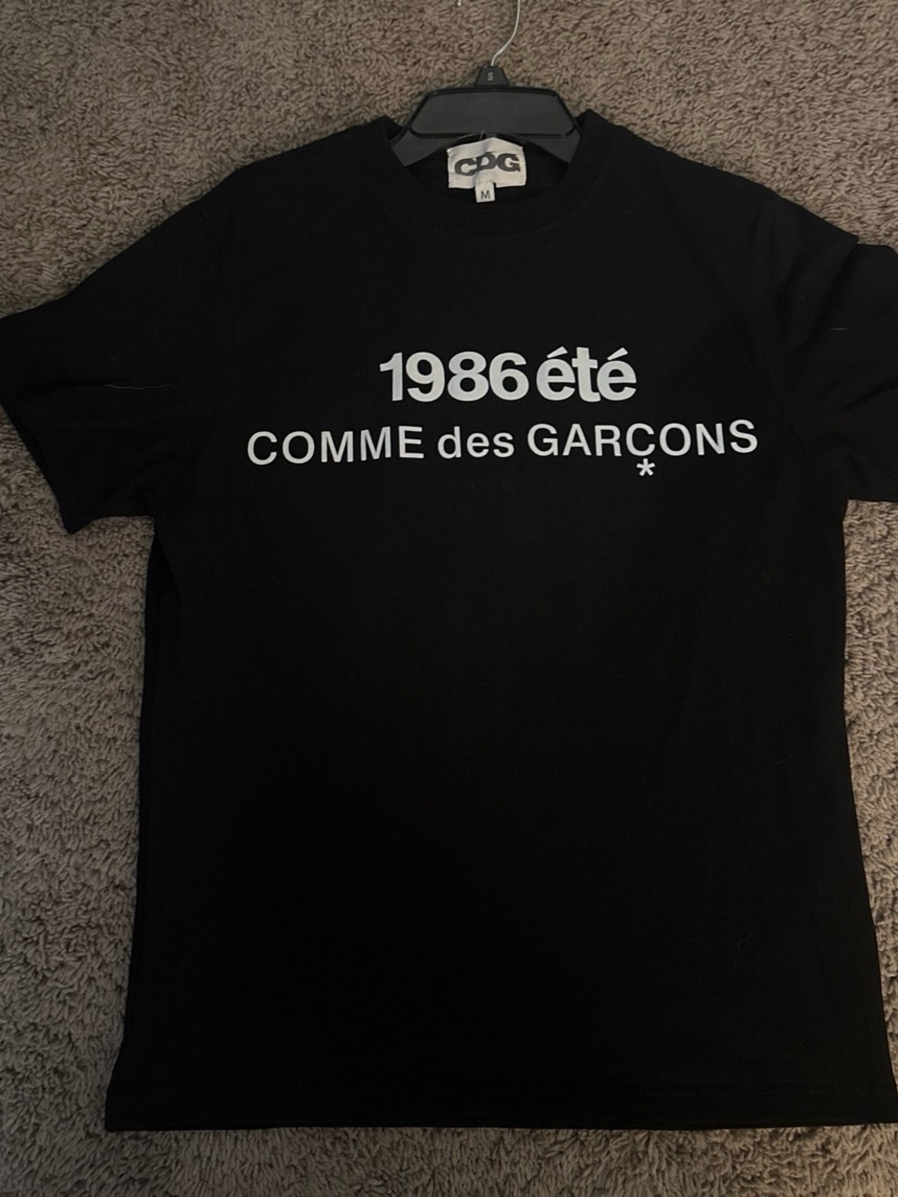 Comme des Garcons Black T-Shirt with White '1986 été' Logo